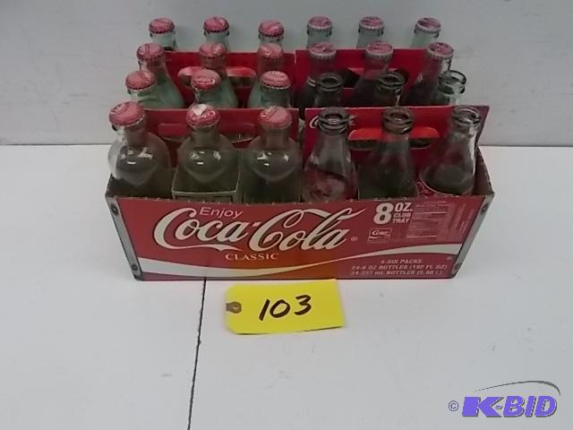 lot 103 image: (24) Asstd Coca-Cola Bottles (4) 6 pk. Carri...