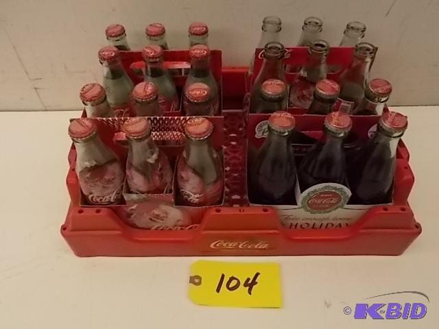 lot 104 image: (24) Asstd Coca-Cola Bottles (4) 6 pk. Carri...
