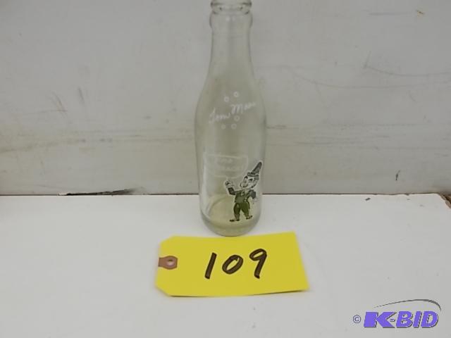 lot 109 image: Tom Moore 7 oz. Bottle...