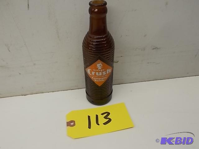 lot 113 image: Orange Crush 7 oz. Bottle...