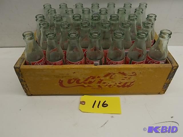 lot 116 image: (33) 8 oz. Coca-Cola Bottles with Wood Coca-C...