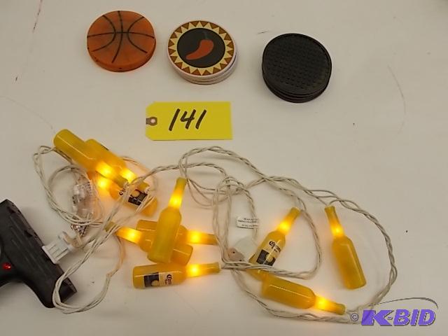lot 141 image: Corona Extra Lights, & Asstd Coasters...