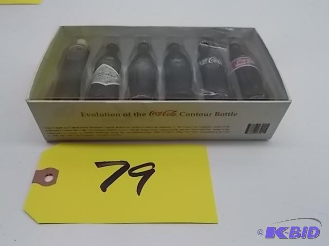 lot 79 image: Coca-Cola Evolution of The Contour Bottle set...