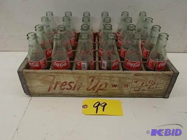 lot 99 image: (24) 8 oz. Coca-Cola Bottles with 7 Up Wood B...