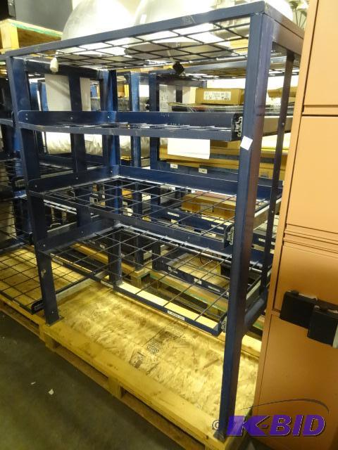 Metal rack with slide out racks. Contents not...