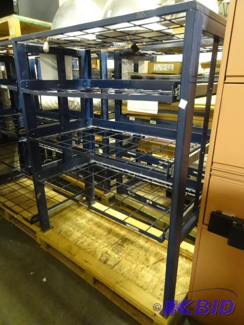 Metal rack with slide out racks. Contents not...