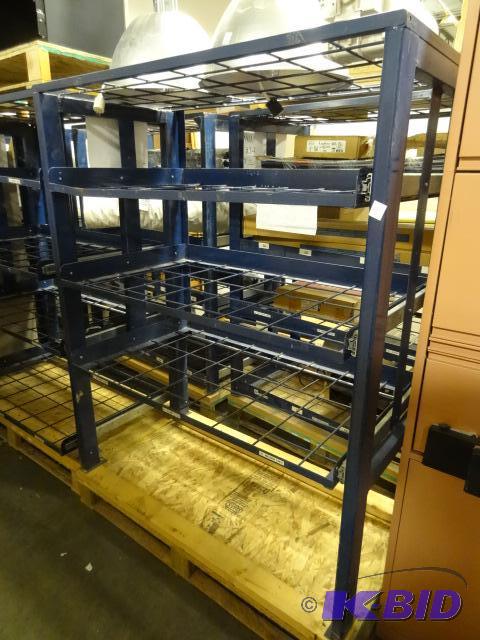 Metal rack with slide out racks. Contents not...