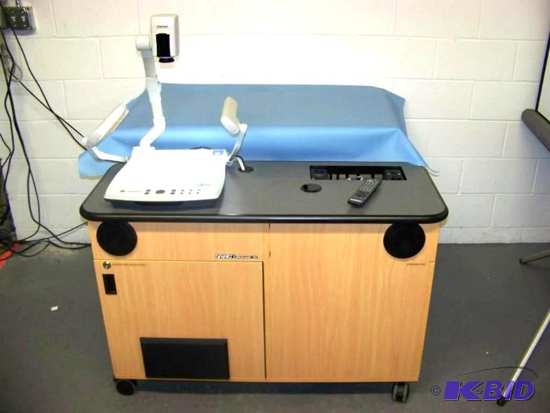 lot 28 image: SmartExpression 303, Multi-Media ConsoleDesk