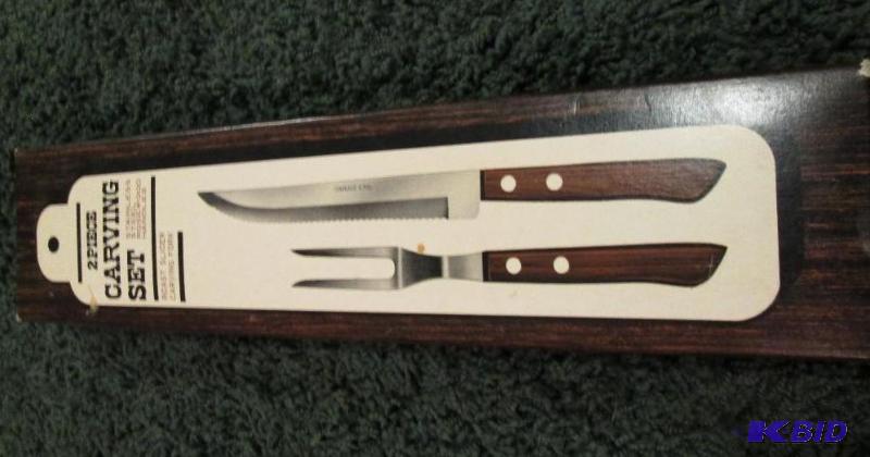 lot 121 image: 2 piece carving set...