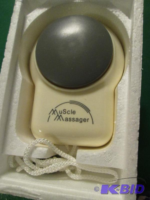 lot 129 image: muscle massager...