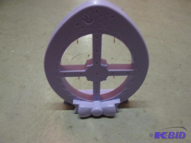 lot 130 image: miniture hanger- egg shaped able to hold 4 mi...