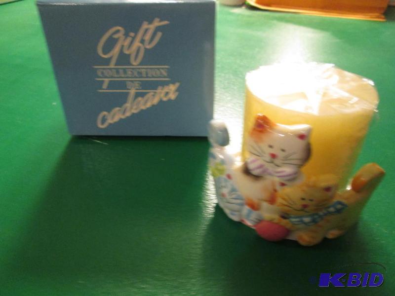 lot 132 image: kitty candle holder with candle...