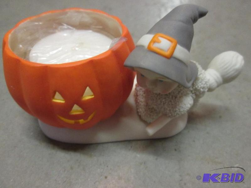 lot 138 image: halloween pumpkin and witch candle holder...