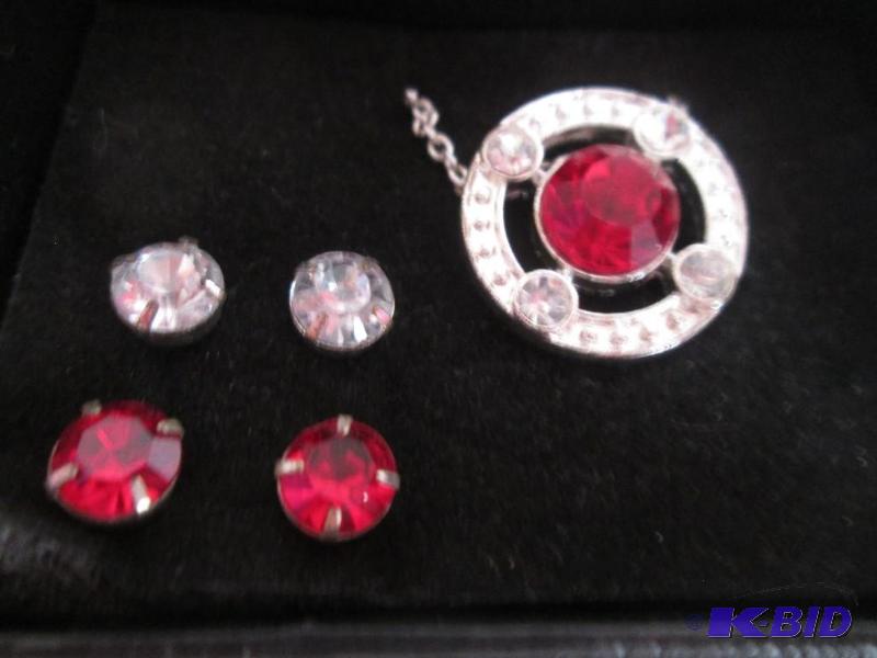 lot 16 image: July Ruby gem stone necklace and matching ear...
