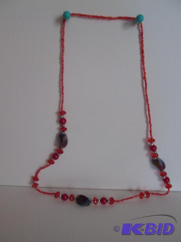 lot 34 image: Red beaded necklace with dark red shimmering ...