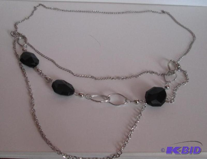 lot 36 image: Sliver chain and black beaded necklace...