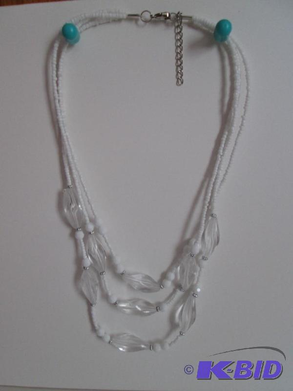 lot 49 image: white and clear beaded necklace...