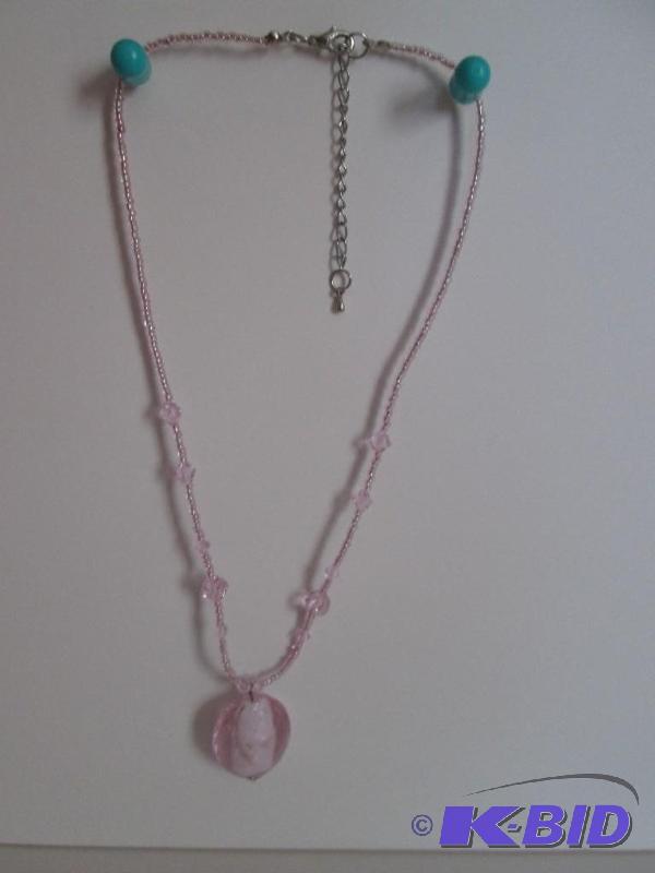 lot 56 image: Pink beaded necklace...