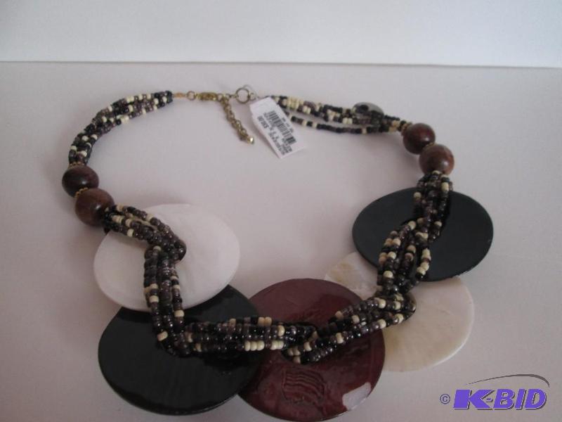 lot 63 image: Neutr seed BD WDISK necklace retail price$3...