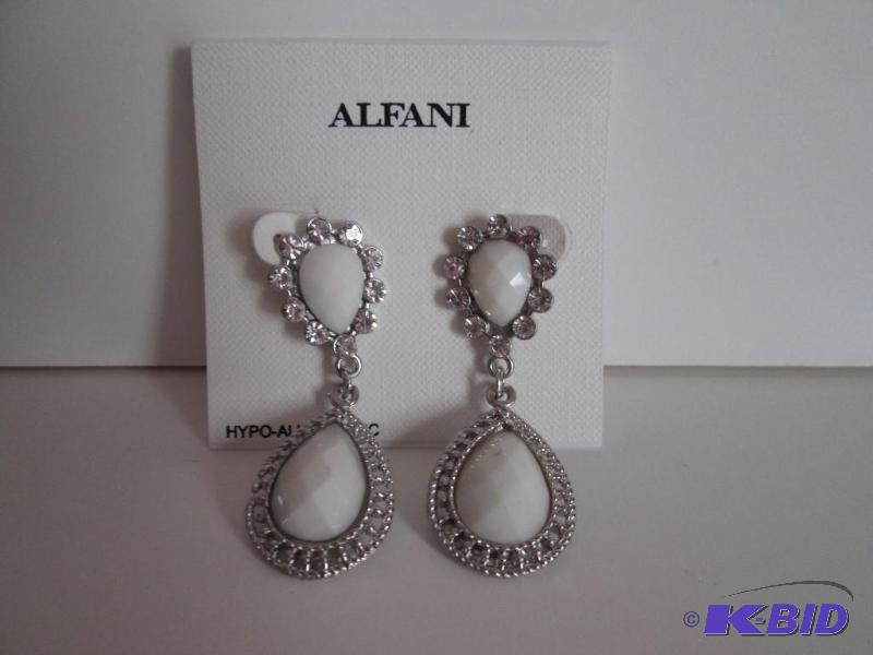 lot 76 image: Alfani Hypo-allergentic white and sliver rine...