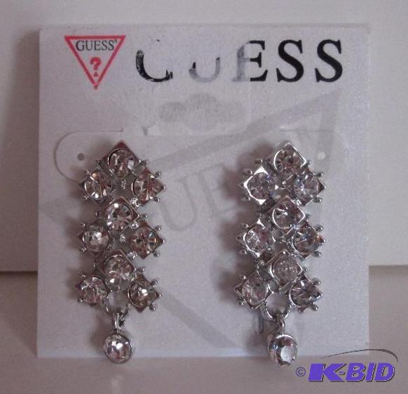 lot 79 image: Guess Diamond look stone earrings...