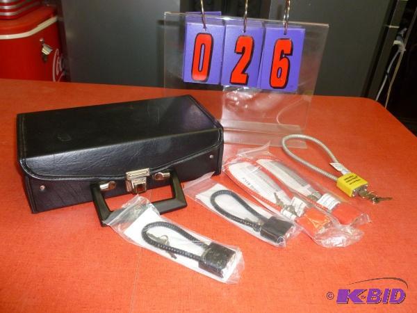 Black case with 5 cable locks with keys. As s...