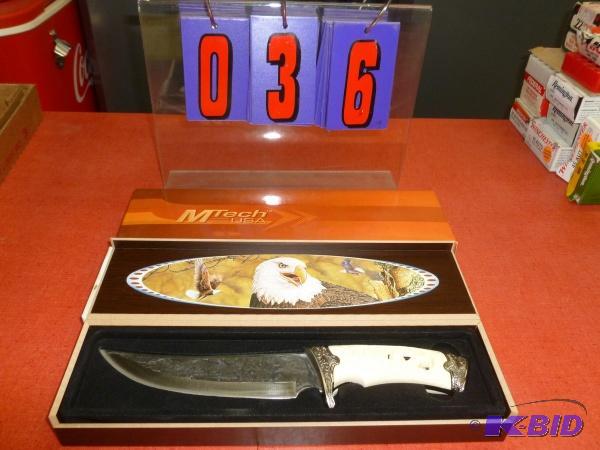 12&quot knife with 8&quot blade. Etched eag...