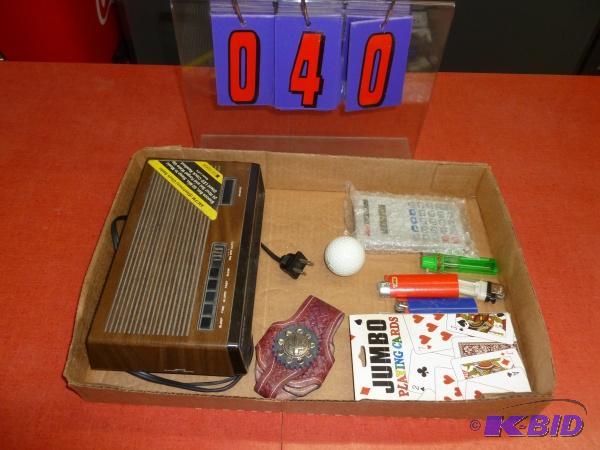 Flat of clock radio, cards, lighters, and cal...