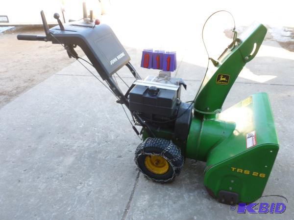 lot 11 image: John Deere snow blower. TRS26 Appears to be 8...