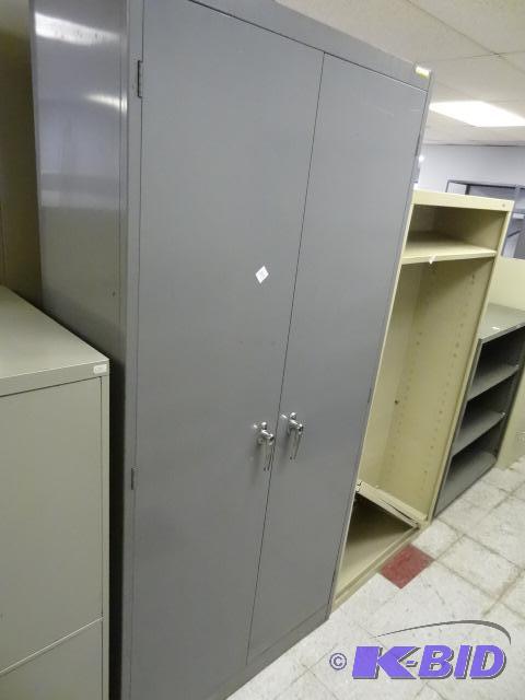 lot 108 image: Metal 2 Door Cabinet 4 Shelves 36 X 18 X 78...