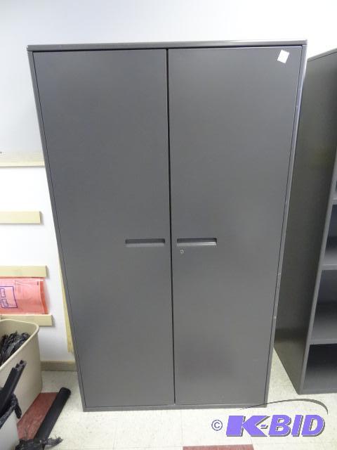 lot 31 image: 2 Door Metal Cabinet. 3 Shelves, 36 X 18 X 63...