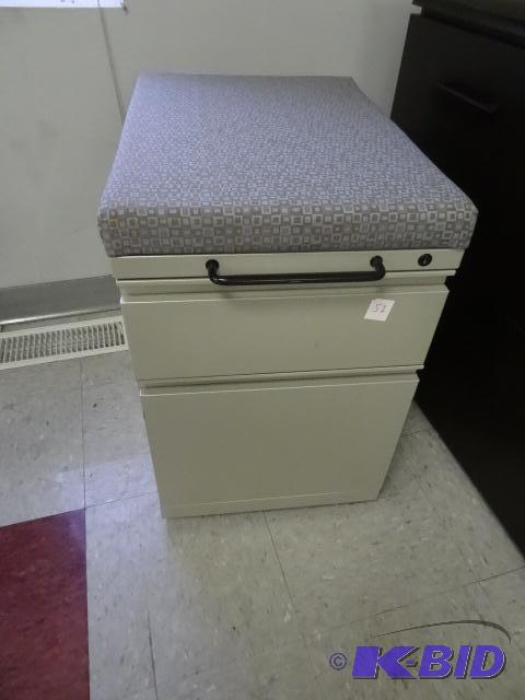 lot 52 image: 2 Drawer Cabinet on Wheels. Padded Top 15 X 2...