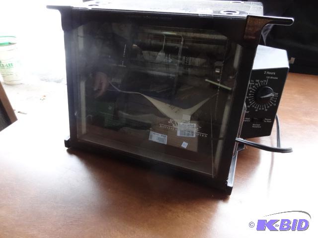 lot 138 image: Ronco JR Showtime Rotisserie and BBQ Oven...
