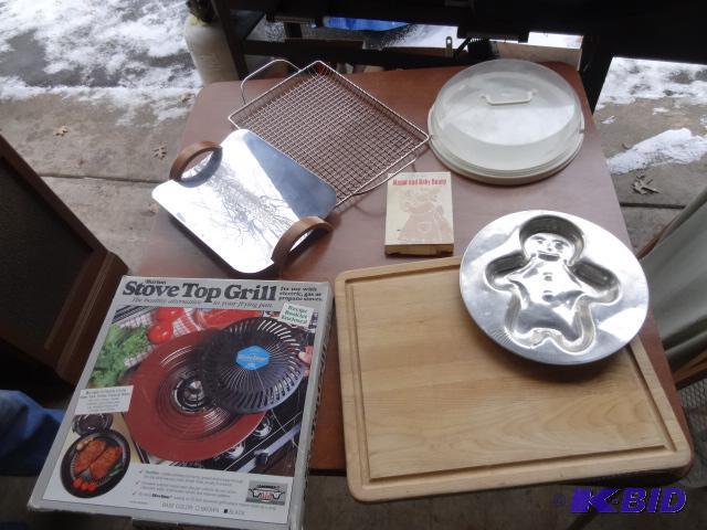 lot 141 image: Ginger Bread Mold. Stove Top Grill. Cutting B...