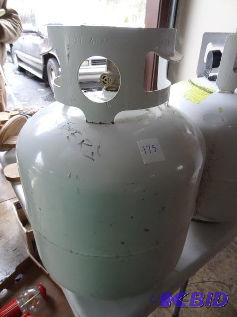 lot 175 image: New Style 20lb Propane Tank...