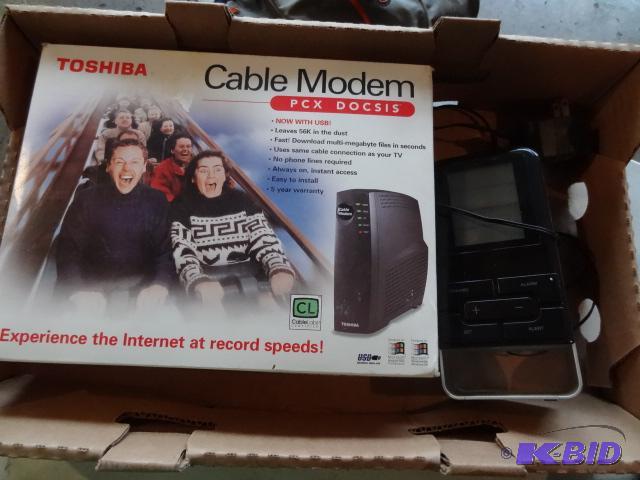 lot 277 image: Toshiba Cable Modem, DIgital Thermoneter...