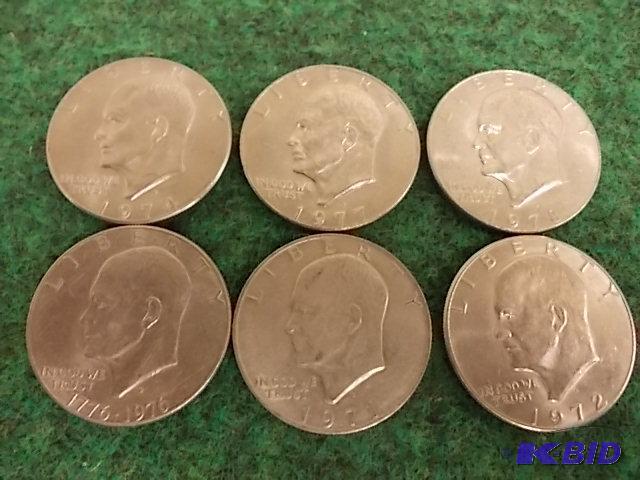 lot 22 image: 6 Ike $1s All With Different Dates...