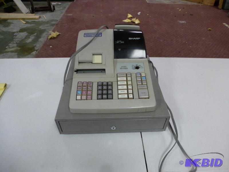 lot 7 image: Sharp Cash register Model# ER- A320 Has lock...