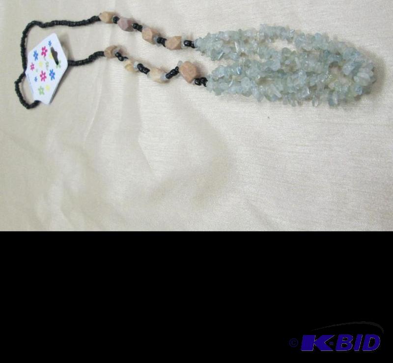 lot 118 image: One necklace...