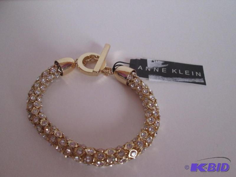 lot 153 image: Anne Klein Gold colored and rinestone braclet...