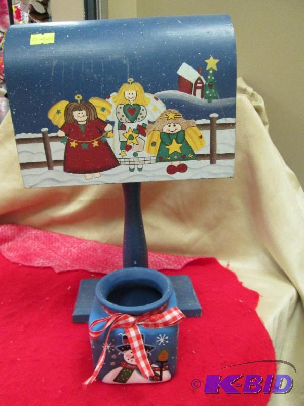 lot 16 image: Mailbox with angles on it on the back says jo...