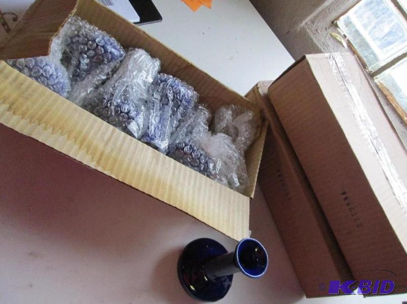 lot 219 image: 3 boxes of small blue vases 6 per box...