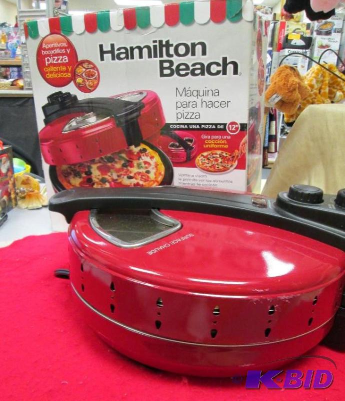 lot 28 image: Hamilton Beach Pizza Maker cooks a 12" p...