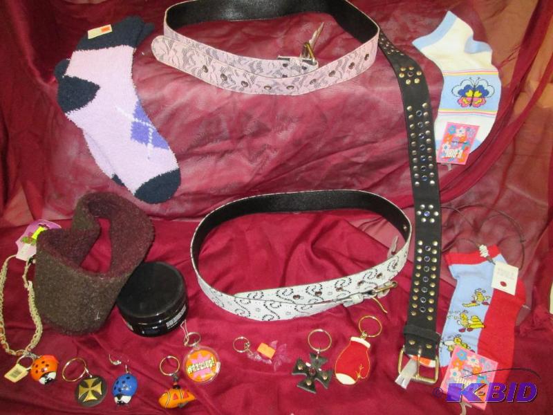 lot 123 image: Keychains, necklaces, three belts size medium...