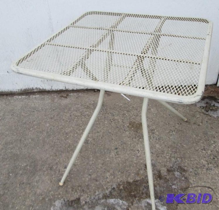 lot 160 image: Folding metal patio table, 29 inches across t...