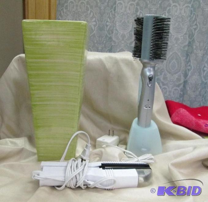 lot 20 image: Revo styler, straightener and a vase...