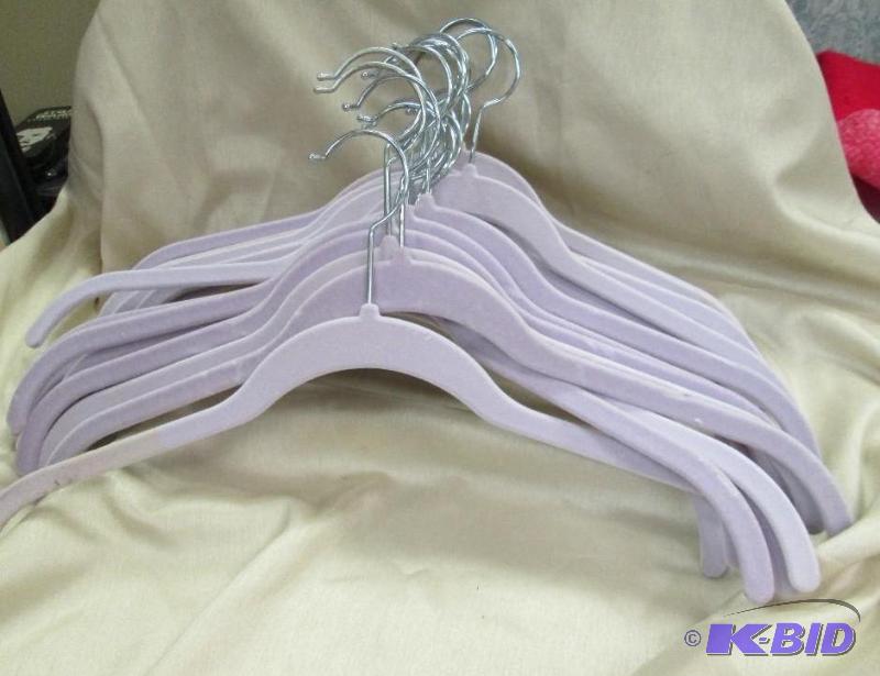 lot 21 image: Qty 24 Joy Mangano hangers...