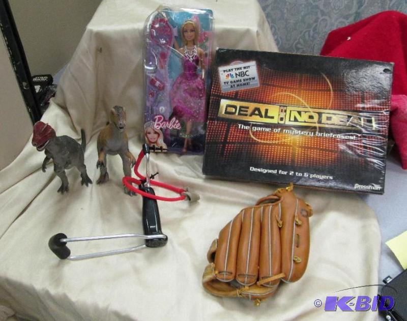 lot 28 image: Deal or No Deal game, Barbie, baseball glove,...