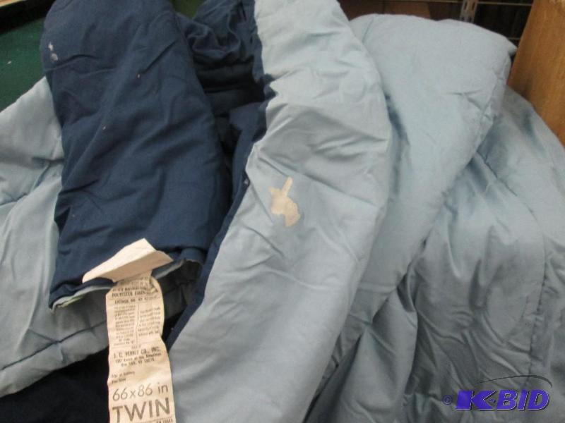 lot 300 image: twin size two toned blue comforter. Used....