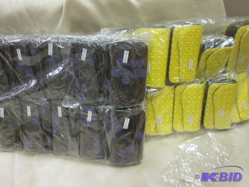 lot 324 image: phone cases, two packages...